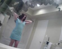 Tattooed girl changing clothes in bathroom - hidden cam